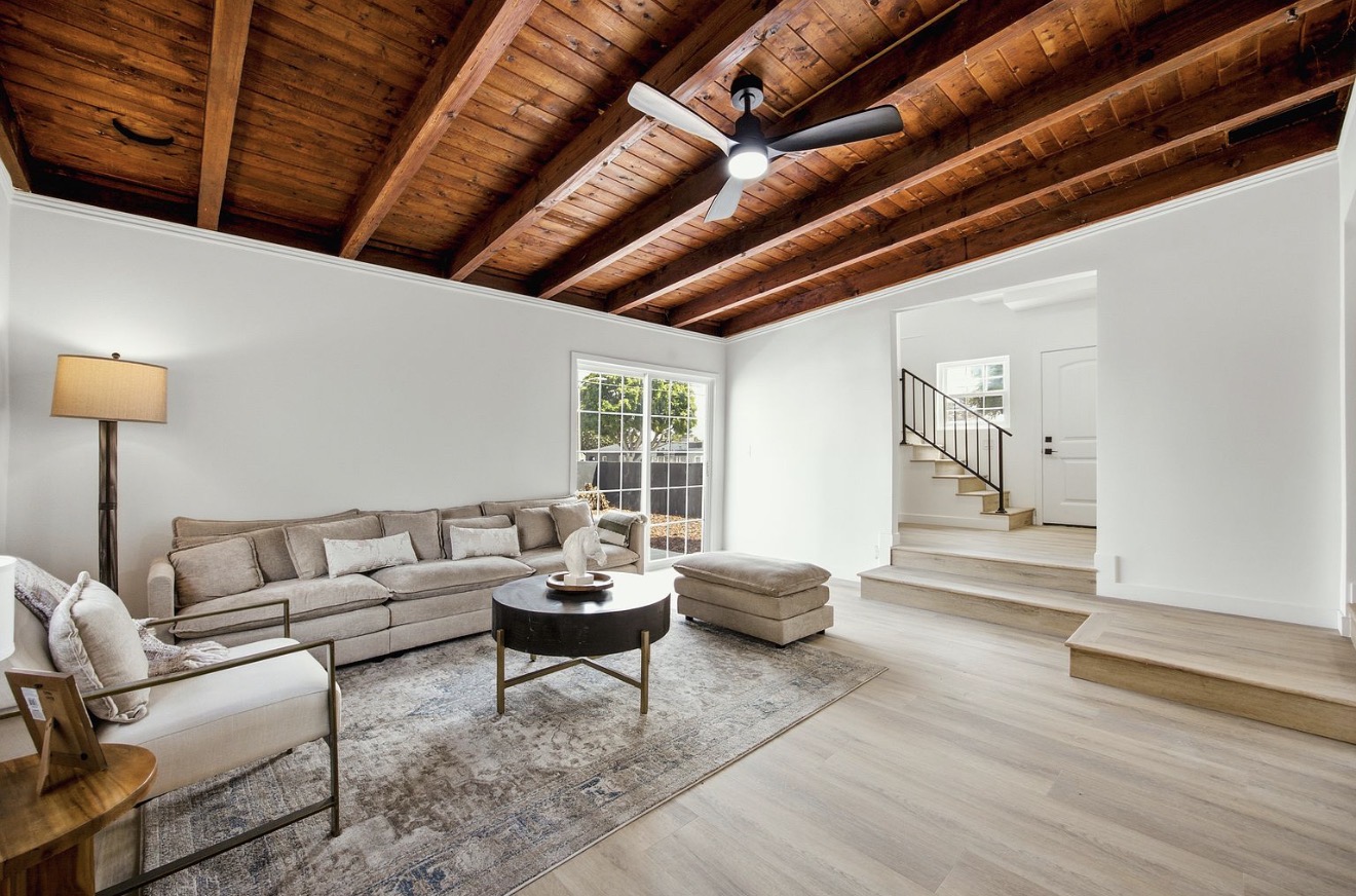 Family room with exposed wood ceiling in the Inglewood residence
