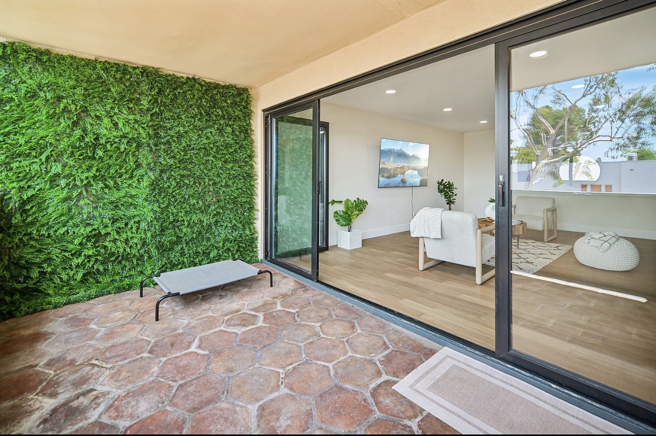 West Hollywood living room opening to a private balcony