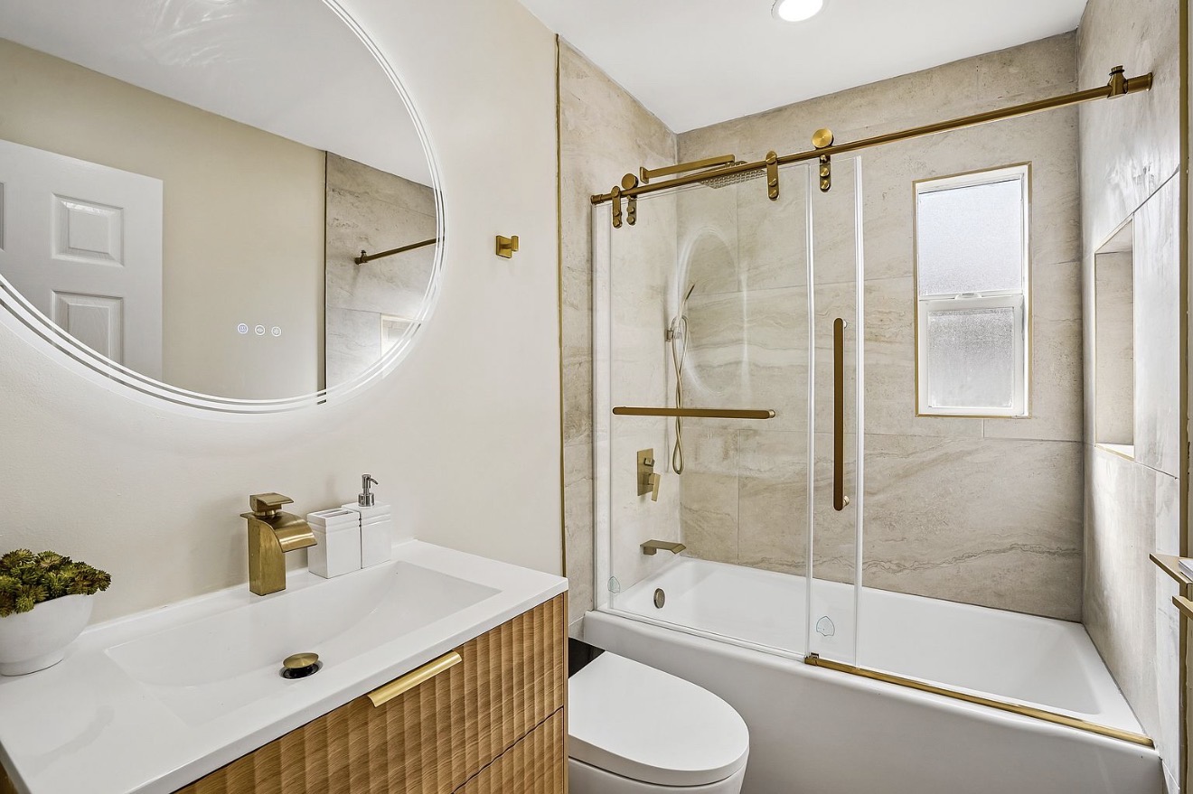Renovated secondary bathroom in the Westchester residence